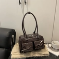 Dark brown patent leather shoulder bag with chic bow pockets and shiny finish - Brown