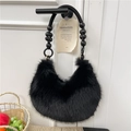 Faux fox fur shoulder bag in black featuring unique wooden bead handle and hobo shape - Black