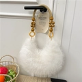White faux fur hobo bag with unique wooden bead handle and bohemian aesthetic - White