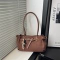 Vintage dark brown suede shoulder bag featuring a buckle strap and wooden bead charm - With Pendant / Coffee
