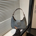 Retro grey-blue wash denim hobo bag with silver M logo and leather trim details - Light Blue