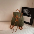 Minimalist green faux suede backpack for women featuring brown trim and drawstring - Green