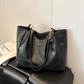 Detail of black faux crocodile texture tote bag with gold chain and MIDI SAC logo - Black