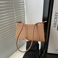 Detail of hand-woven straw shoulder bag with leather strap and polka dot silk scarf - With Pendant / Brown