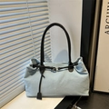 Light blue denim tote bag with black leather straps and metal buckle for daily commute - Light Blue