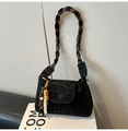 Retro shoulder bag featuring dark leopard print fabric and a brown braided handle - With Pendant / Black Leopard