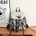 Dettaglio di zaino vintage a quadri con fiocco in pizzo e stampa a stelle carine - Quadri Verde Menta Con Fiocchi