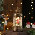 Dettaglio lanterna natalizia in bronzo con Babbo Natale e palla di neve scintillante - Babbo Natale non rotante