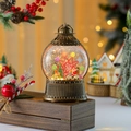 Detail of a vintage bronze Christmas lantern with a rotating Ferris wheel and glitters - Cycling Santa