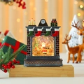 Detail van een kersthaard muziekdoos met de kerstman in een lichtgevende sneeuwbol - Zittende Kerstman