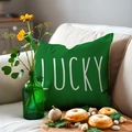Saint Patrick's Day cushion cover with Lucky text and green clover design on sofa - Dark Green Lucky Alphabet Style (22YM51-3)