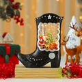 Détail macro de bottes boule à neige de Noël avec scène lumineuse du Père Noël - Père Noël aux Cadeaux