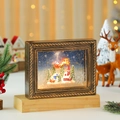 Detalle del marco de bola de nieve navideña con Papá Noel y luces LED brillantes - Trineo de Papá Noel con Reno