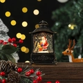 Détail d'une lanterne de Noël vintage avec Père Noël et paillettes effet neige brillante - Père Noël Rectangulaire