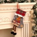 Detail of Christmas stocking with 3D reindeer decor and long legs on a white mantelpiece - Elk Style