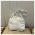 Close-up of white patent leather shoulder bag with smooth glossy finish and thin straps - White Without Pendant