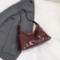 Minimalist burgundy patent leather underarm bag with gold zipper and mirror finish - Red