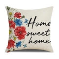 Detail eines Leinenkissenbezugs mit roten Mohnblumen, blauen Schmetterlingen und Home-Schriftzug - Home Sweet Home Blumenstil (23YM16-2)