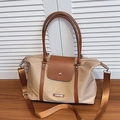 Grande borsa tote in tela kaki con manici in pelle marrone e tracolla larga regolabile - Marrone