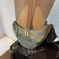 Minimalist bean green nylon crescent crossbody bag with woven zipper pull details - Green