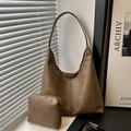 Large dark brown leather hobo tote bag with matching zipper pouch and minimalist style - Tan