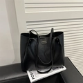 Large black leather tote bag with stylish shoulder straps and fashion gold lettering - Black