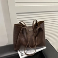 Dark brown oil wax leather tote bag with gold logo and retro shoulder strap - Brown