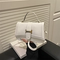 Elegant cream quilted handbag with gold hardware and top handle for women - White