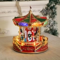 Détail d'un carrousel musical de Noël rotatif avec des lumières LED et un design festif - Grand Toit Vert (28*23*23cm)