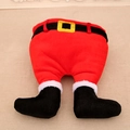 Detailed view of plush Santa pants decoration with black belt and golden buckle - Belt Style