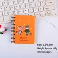 Taccuino A7 di Natale arancione con illustrazioni di renne e omini di pan di zenzero - Giallo