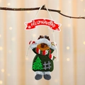 Πλούσιo τάρανδος στολίδι με πανό Feliz Navidad κρεμασμένο σε γιορτινό κλαδί - Ελάφι
