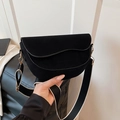 Semicircle saddle bag with wavy flap and wide strap in black matte leather - Black