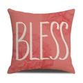 Detail of coral linen cushion cover with white BLESS text and floral pattern - Pink BLESS Floral Style (YMM4-4)