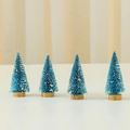 Lot de 4 mini sapins de Noël bleu lac de 10 cm avec effet neige et base en bois - Bleu (Lot de 4)