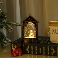 Bronze Christmas phone booth snow globe lantern with snowman and glowing gold glitter - Flat Lantern Water Filled Snowman Style