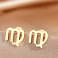 Macro shot of gold polished Virgo constellation stud earrings on silk fabric - Gold Virgo (F1205-Virgo)