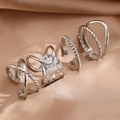 Set of 4 adjustable silver geometric rings with twisted and hammered textures - Silver Color (C9400) / 4-Piece Silver Set (C9400)