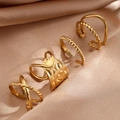 Four-piece gold geometric cross ring set with twisted texture on luxury silk background - Gold Color (C9399) / 4-Piece Gold Set (C9399)