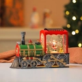 Vintage red Christmas train snow globe with Santa and reindeer, glowing festive ornament - Steam Train Head Santa Rotating (Light Music)