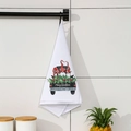 White Christmas hand towel featuring festive gnomes on a black truck with hanging loop - Car Style / White