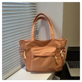 Dettaglio della borsa tote arancione albicocca con tasche a coulisse e design multi-tasca pratico - Arancione