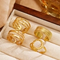 Set of four adjustable gold-plated stainless steel geometric rings in a soft velvet box - Gold 4-Piece Set (C8753)