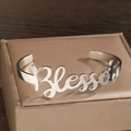 Silver adjustable stainless steel open cuff bracelet with Blessed cutout lettering - Blessed Lettering Style (F1400)