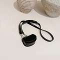 Mini semi-circle crossbody bag in black matte finish with thin strap and silver hardware - Black