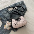 Sac rose à bulles matelassé avec nœuds noirs, pendentif cœur argenté et breloque lapin - Rose Avec Pendentif