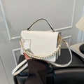Elegant white crossbody bag with braided chain strap and minimalist metal lock - White