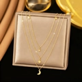 Collier à trois rangs en acier inoxydable doré avec pendentifs lune et étoiles - Or (C9295)