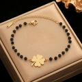 Golden clover charm bracelet with black beads and adjustable lobster clasp closure - Gold Clover Style (F1377)