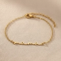 Vista macro del bracciale mama in acciaio inossidabile dorato con chiusura a moschettone - Stile Oro(F1517)